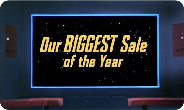 Star Trek Starships Collection Official Vintage television set with 'Our BIGGEST Sale of the Year' text on a dark screen